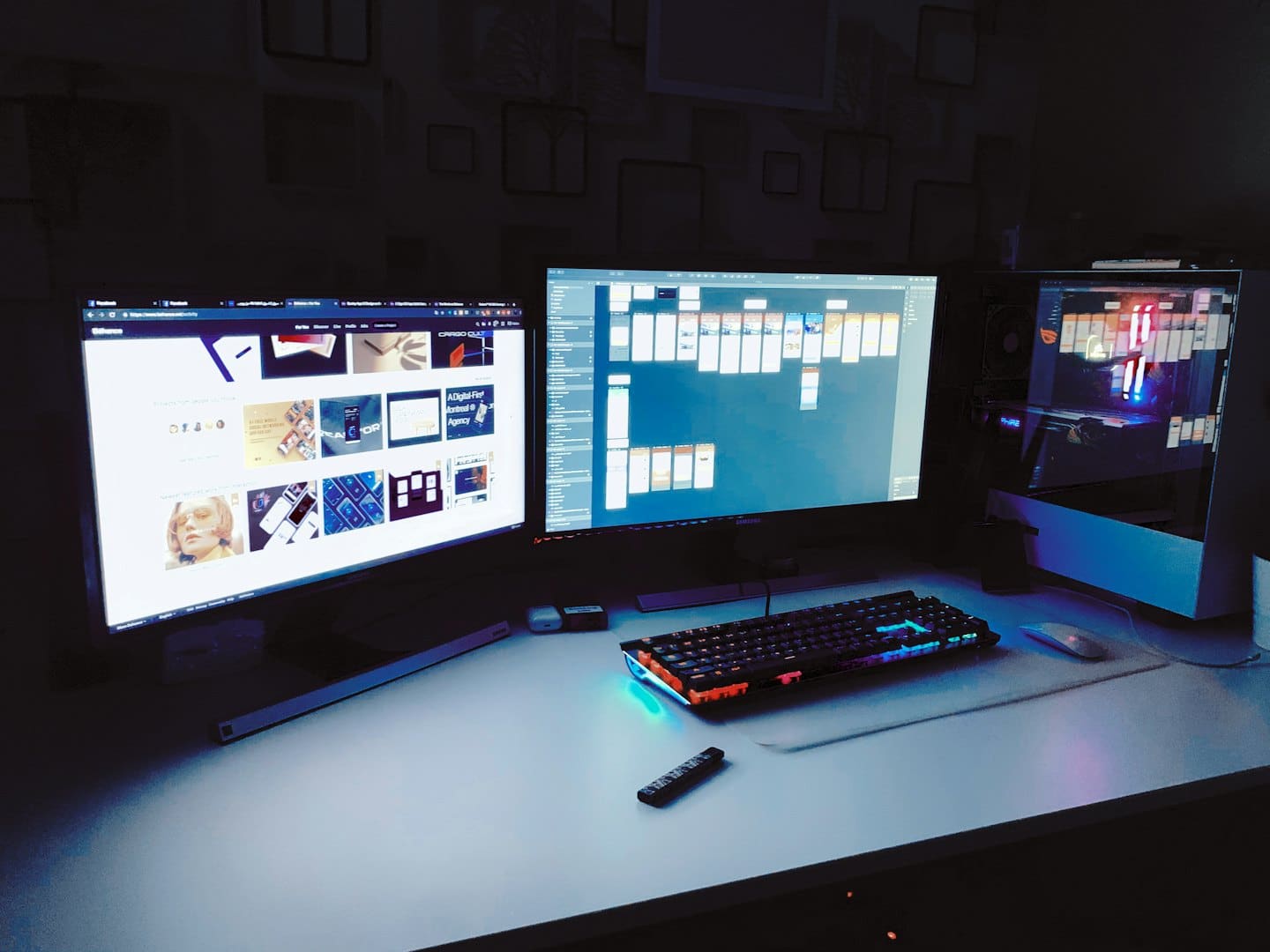 Dual computer monitors with open software on a desk.
